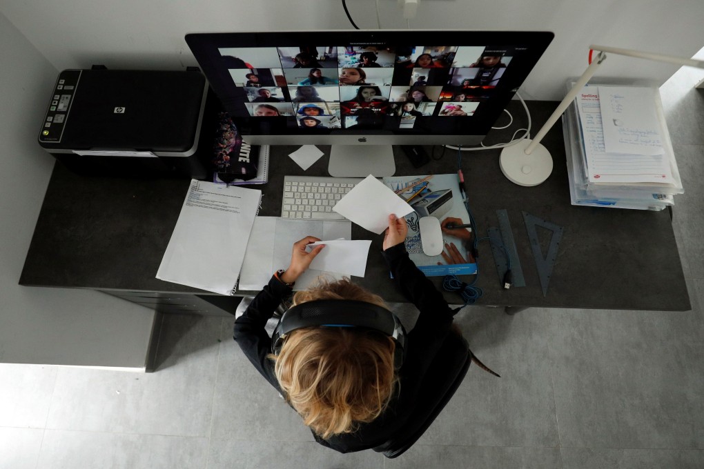A student attends online classes using Zoom at home in El Masnou, Spain, on April 2, during a lockdown sparked by the coronavirus pandemic. Photo: Reuters