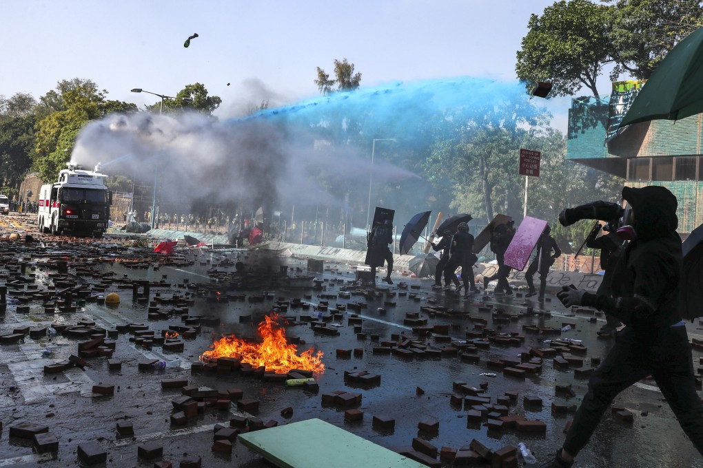 Protesters and police clash near Polytechnic University in November. Photo: Sam Tsang