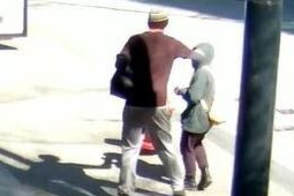 Closed-circuit TV footage shows a man punching an Asian woman in the face in downtown Vancouver on April 12, in what police called an unprovoked attack. Photo: Vancouver Police Department