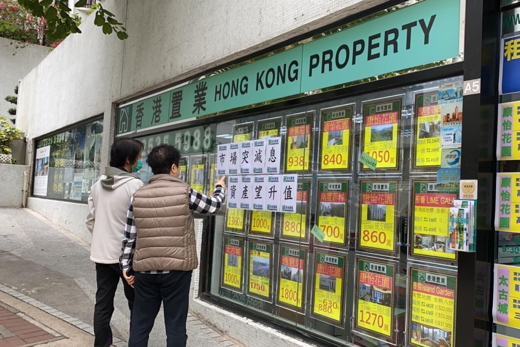 Bills stuck on a property agent’s office on March 4, 2020, says buyers should take advantage of the Federal Reserve’s rate cut as it will boost Hong Kong’s housing market. Photo: Handout