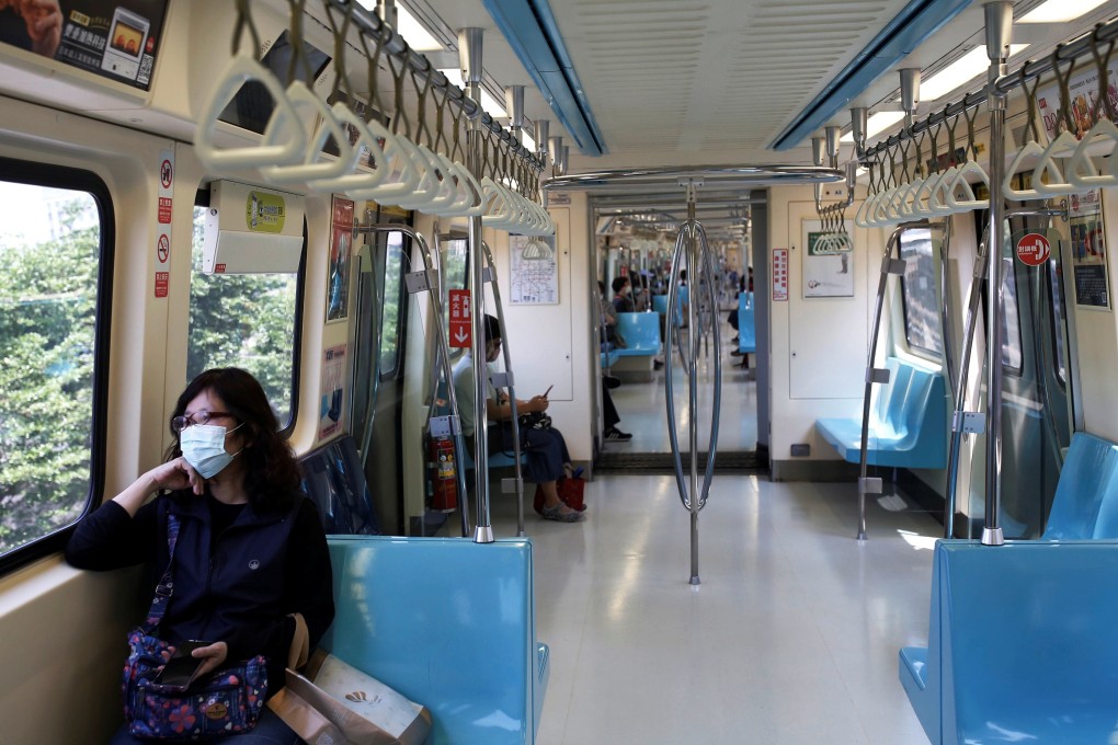 Face masks are mandatory on public transport in Taipei. With 439 coronavirus cases and six deaths reported, Taiwan has been widely praised for its response to the pandemic. Photo: Reuters