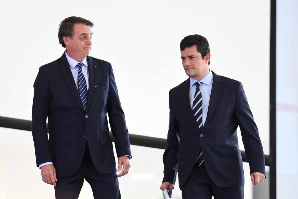 Brazilian President Jair Bolsonaro (L) with former justice minister Sergio Moro. Photo: AFP