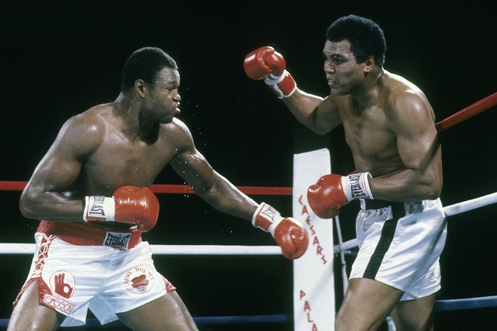 Muhammad Ali (right) takes on Larry Holmes in Las Vegas, during a fight which Ali previously suggested could be moved to Tehran. Photo: Getty Images