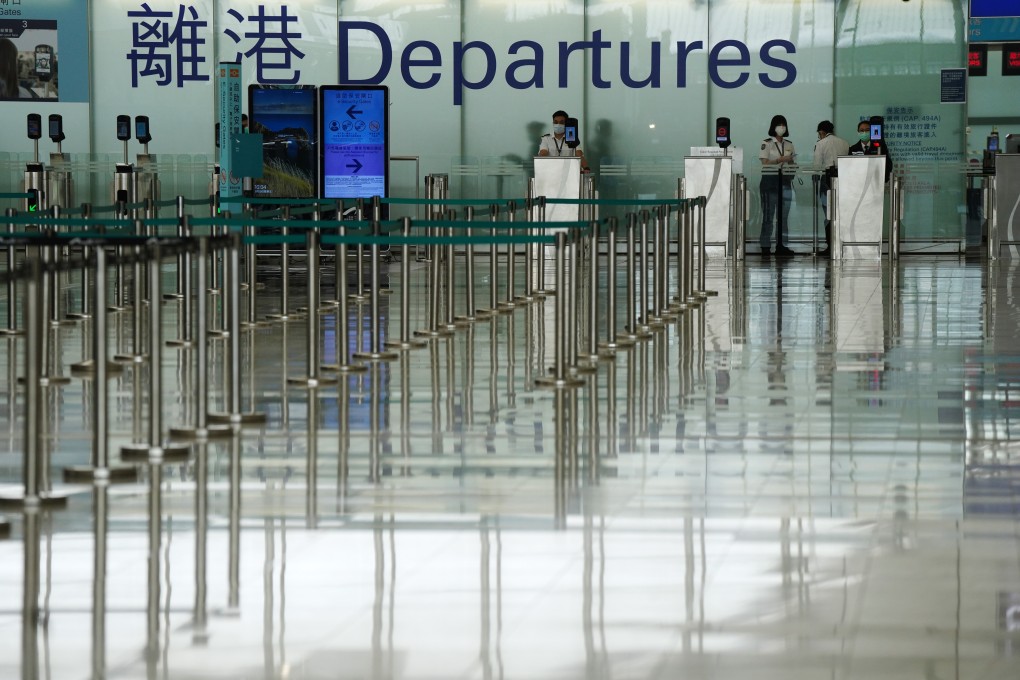 Hong Kong International Airport’s departure hall appears deserted amid the coronavirus pandemic. Photo: Sam Tsang