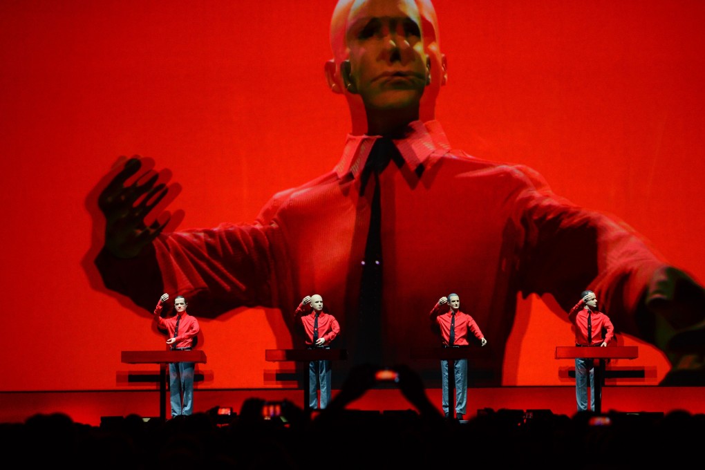 German band Kraftwerk’s “Roboter” is performed during a concert at the New National Gallery museum in Berlin in January 2015. Photo: AFP