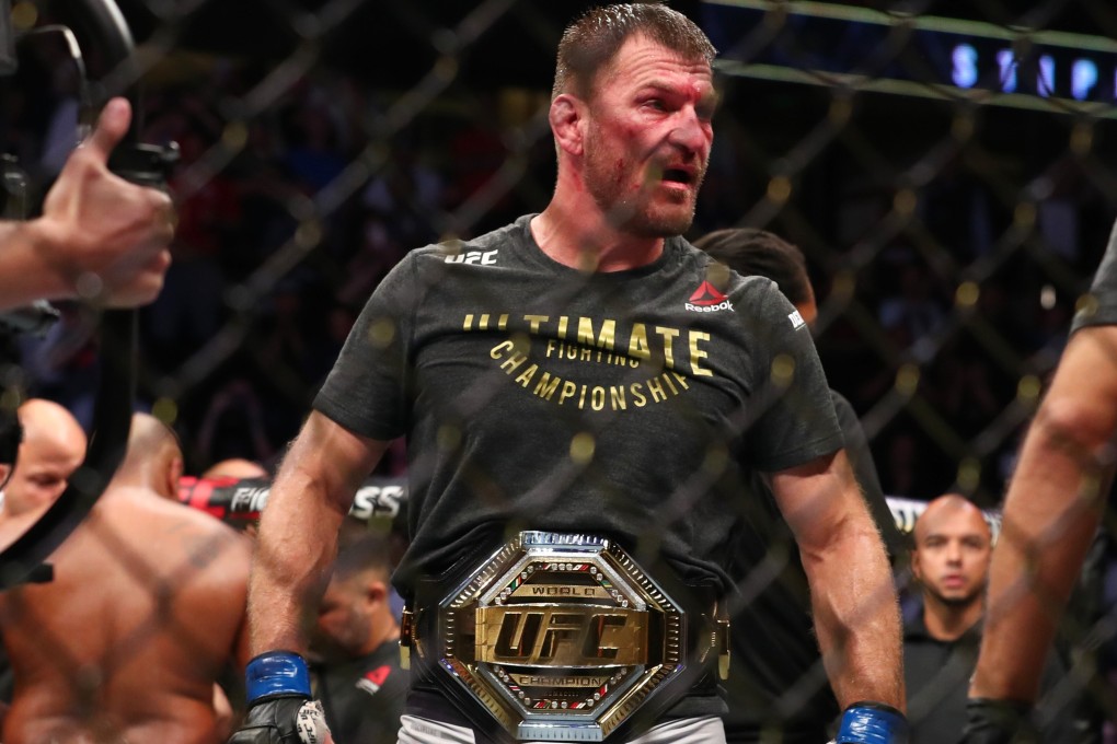 Stipe Miocic celebrates his win over Daniel Cormier after their UFC heavyweight title rematch at UFC 241. Photo: AFP