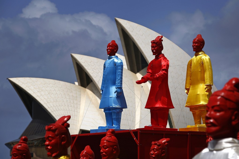 An art installation called the “Lanterns of the Terracotta Warriors” stands in front of the Sydney Opera House in February 2015. The lanterns, more than two metres high, were on display as part of Sydney’s Lunar New Year Festival. Photo: Reuters