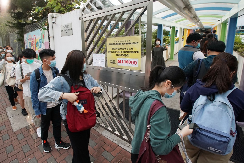 Student wait to start a Diploma of Secondary Education exam at the Textile Institute American Chamber of Commerce Woo Hon Fai Secondary School in Tsuen Wan. Photo: Felix Wong