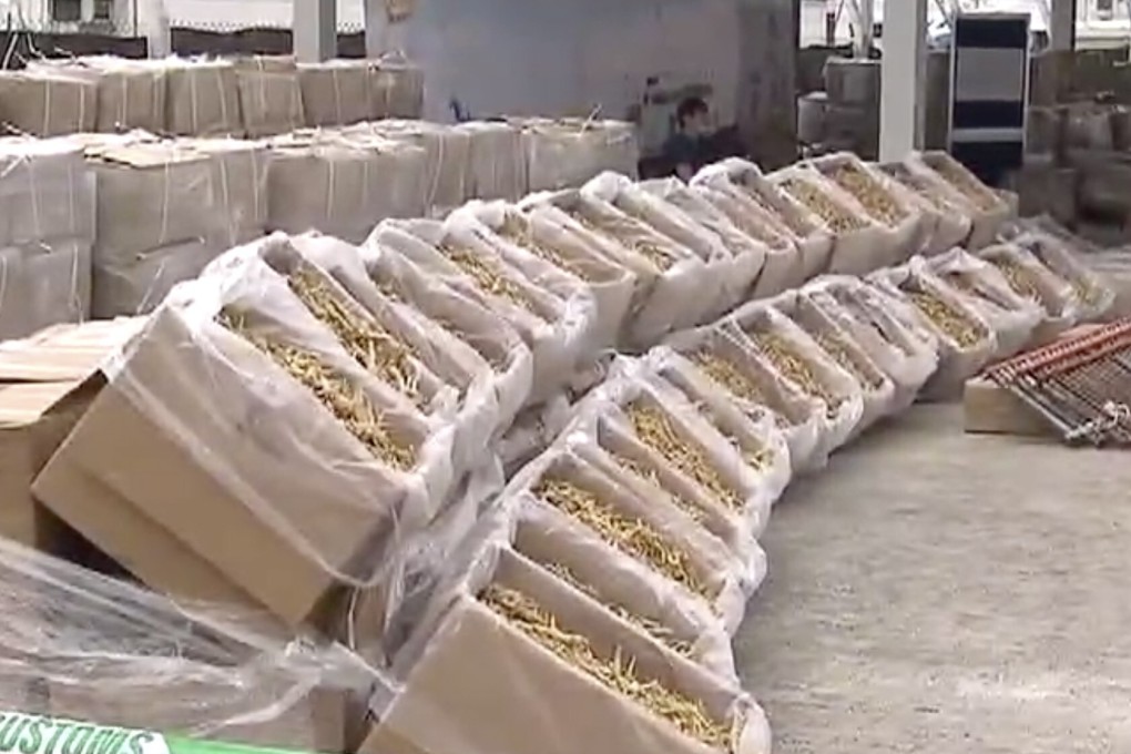 Thirty-four tonnes of American ginseng worth more than HK$47 million was seized and seven people arrested by Hong Kong authorities on Thursday. Photo: TVB News