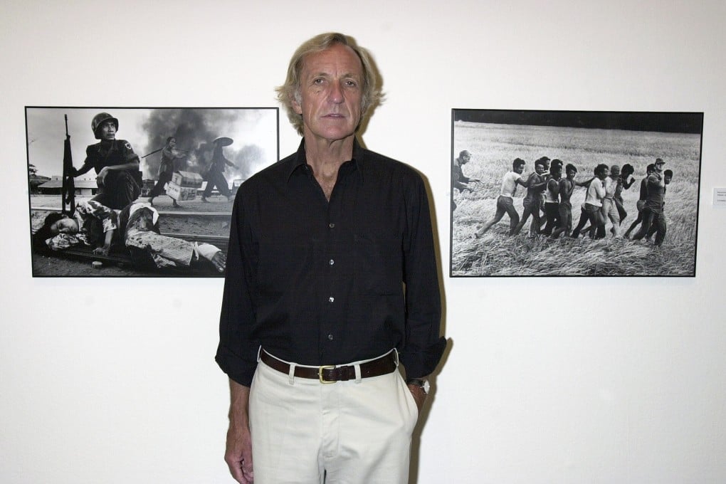 Journalist John Pilger at an exhibition titled “John Pilger: Reporting The World”, at London’s Barbican Centre, in 2001. Photo: Getty Images