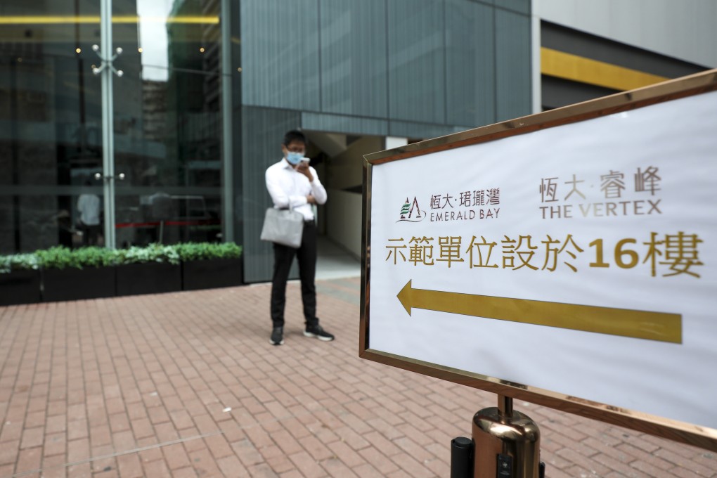 Sales agents outnumber homebuyers at the sales office of China Evergrade’s Emerald Bay project at Billion Plaza in Cheung Sha Wan on May 9, 2020. Photo: Xiaomei Chen