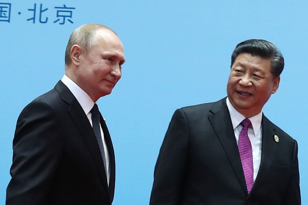 Chinese President Xi Jinping and Russian counterpart Vladimir Putin say they are committed to working together to fight Covid-19. Photo: AFP