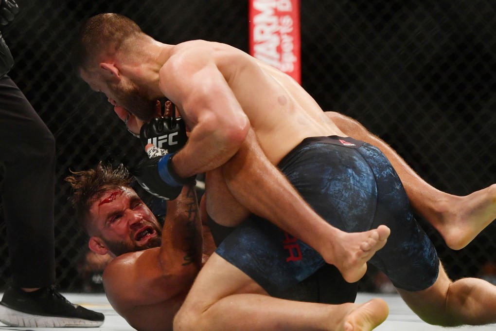 Calvin Kattar reigns down blows on Jeremy Stephens on the canvas. Photo: USA TODAY Sports
