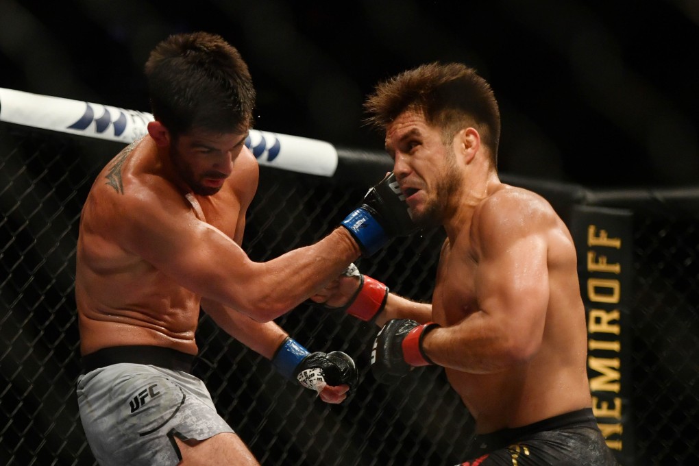 Henry Cejudo exchanges with Dominick Cruz at UFC 249. Photo: USA TODAY Sports