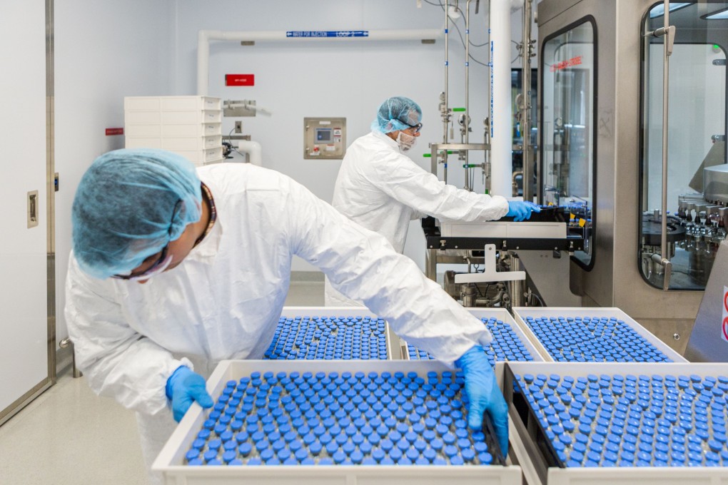 Lab technicians loading vials of remdesivir at a Gilead Sciences facility in La Verne, California. Photo: Reuters