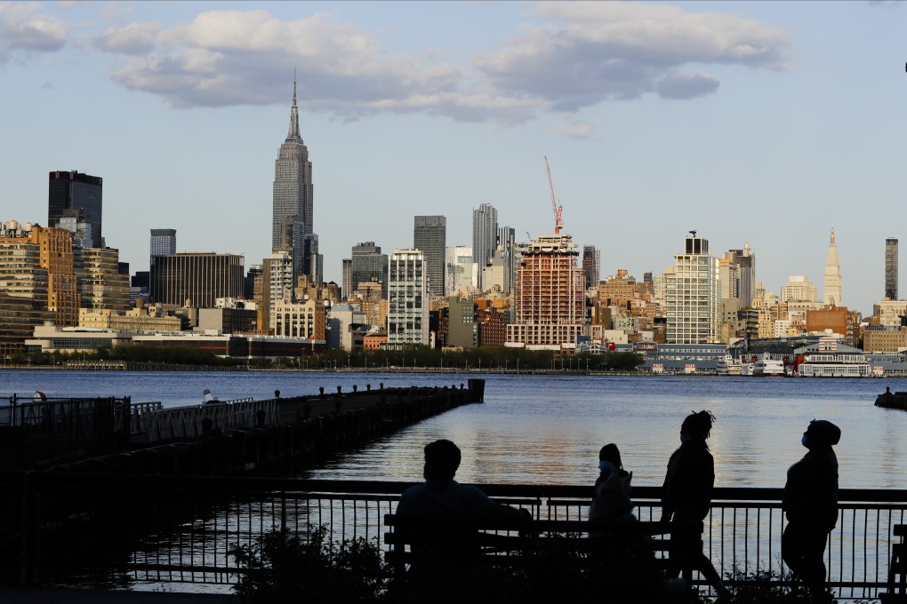 The skyline of midtown Manhattan, New York, is seen from Hoboken, New Jersey, on May 7. The continuing fallout from the coronavirus may trigger a collapse in US growth and send US interest rates into negative territory, putting pressure on the dollar’s safe-haven status. Photo: AP