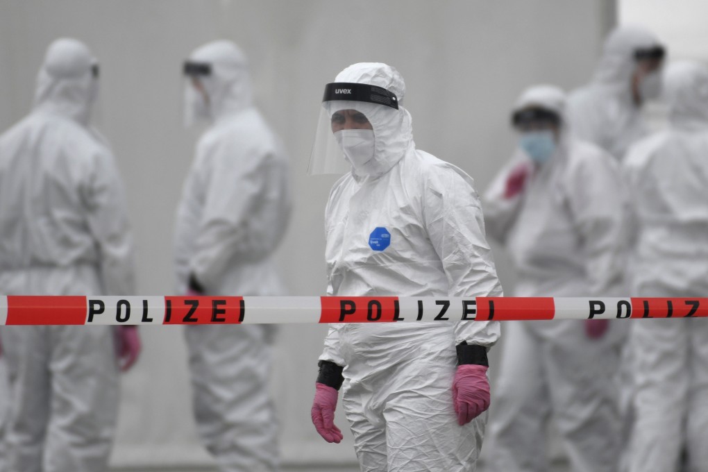 Health care workers prepare to test employees for Covid-19 at factory owned by the Westfleisch meat processing company in Hamm, Germany, on Sunday. Photo: AFP