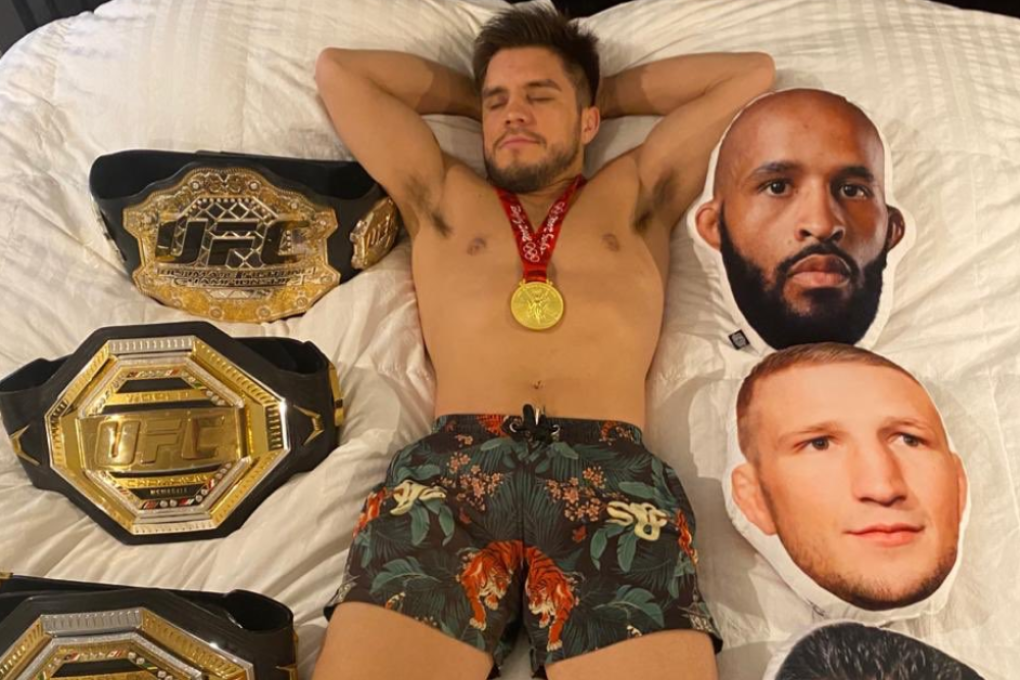 UFC bantamweight champion Henry Cejudo sleeps with his belts and pillows with the faces of Demetrious Johnson, TJ Dillashaw and Dominick Cruz. Photo: Twitter/Henry Cejudo