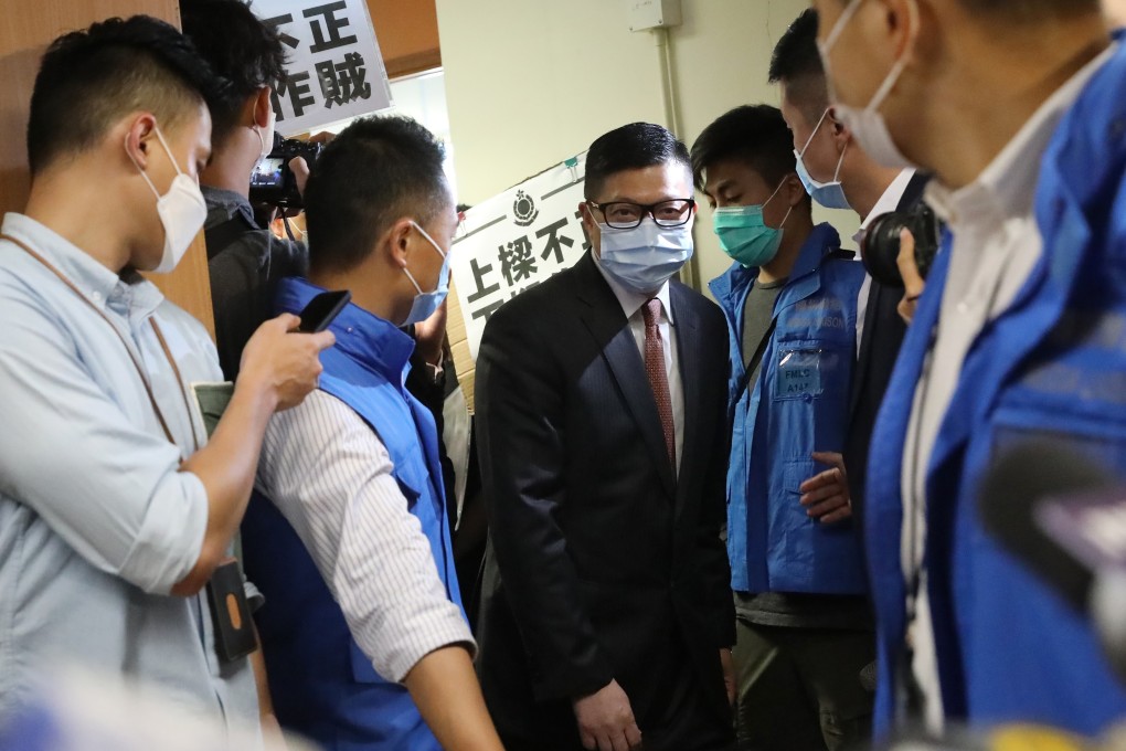 Chris Tang arrives at the meeting of Yuen Long District Council on Tuesday, where he said the girl was wanted by police. Photo: K.Y. Cheng