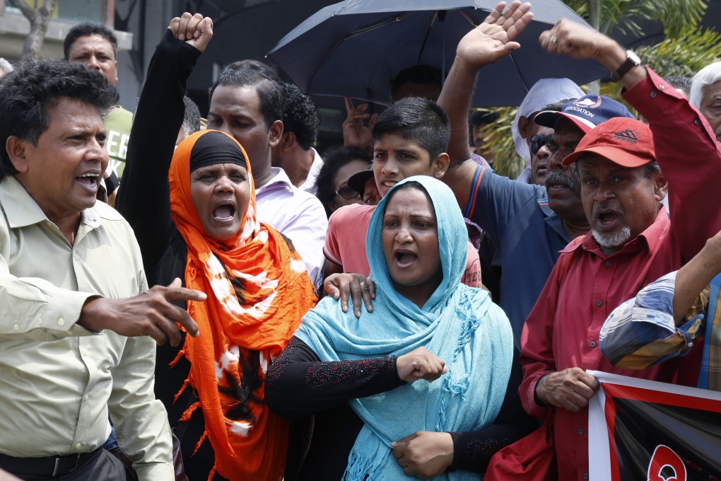 Members of Citizens Against Racism protest attacks on Sri Lankan Muslims in 2018. Photo: EPA