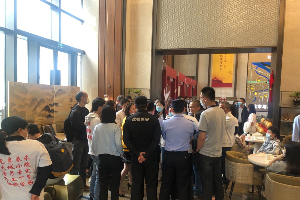 More than 300 of the 2,000 customers who bought flats at Tahoe’s Dacheng Xiaoyuan project have been staging protests at its sales centre and posting articles on social media platforms. Photo: Handout