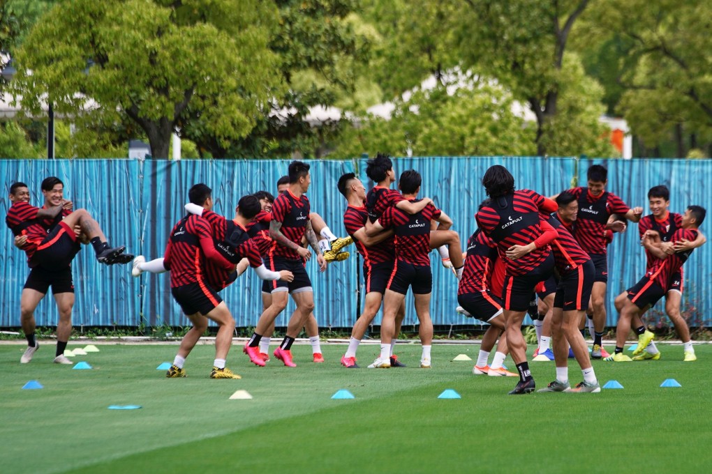 Shanghai SIPG players in their first public training session for the new season following the coronavirus outbreak. Photo: Reuters