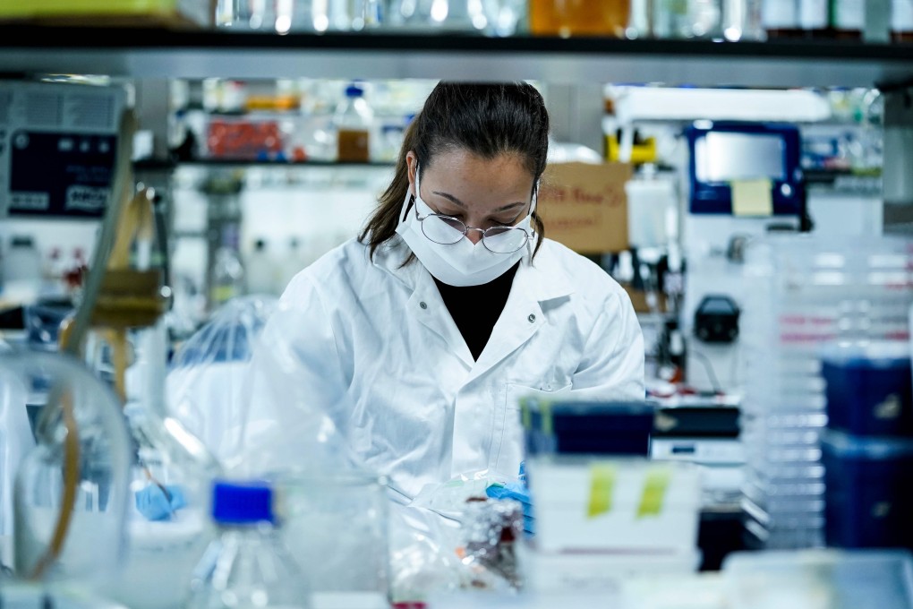 A virologist in Belgium works on finding a treatment against Covid-19. Photo: AFP