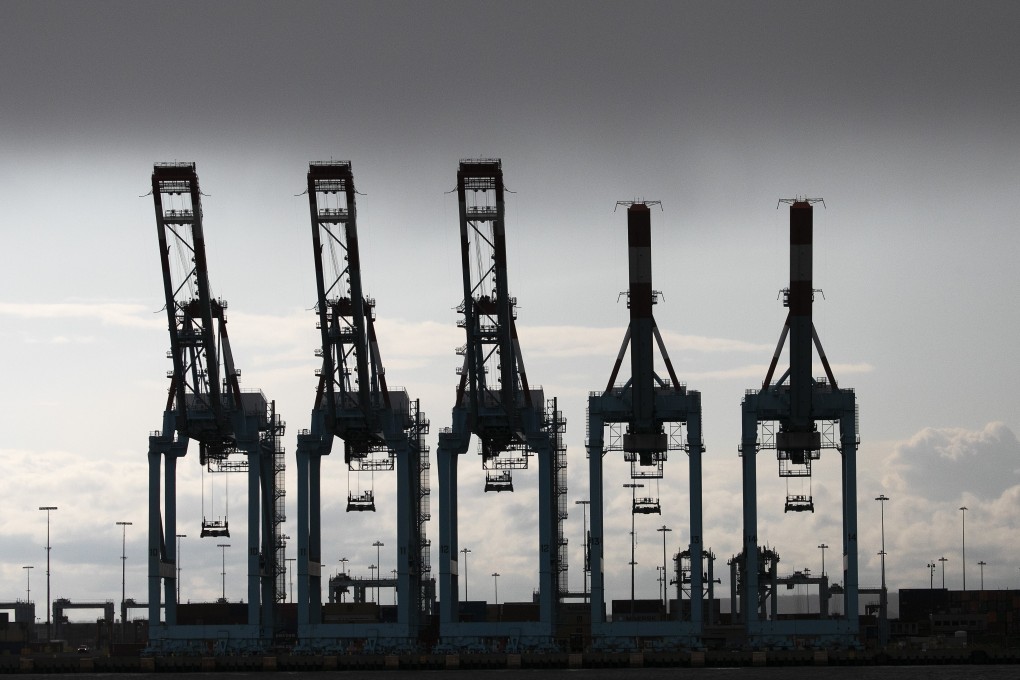 Gantry cranes stand idle at APM Terminals in Elizabeth, New Jersey, US, on May 11. The lockdowns and travel restrictions put in place to contain the coronavirus pandemic have hammered the world economy. Photo: AP