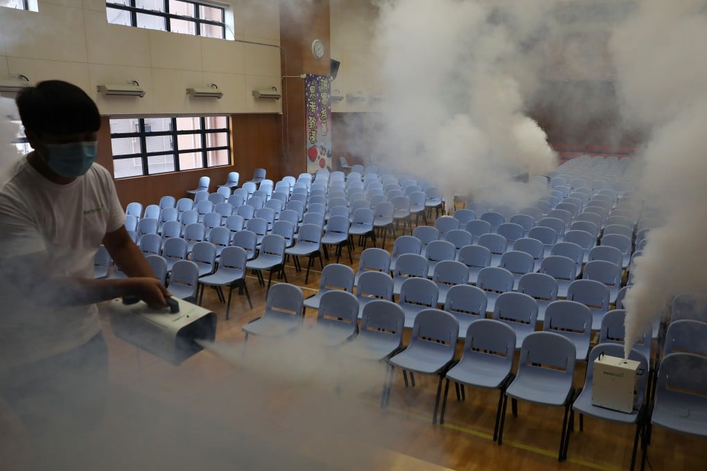 An antibacterial mist treatment is deployed at Hong Kong’s SKH St James’ Primary School as a precautionary measure against the spread of Covid-19 on campus. Photo: Nora Tam