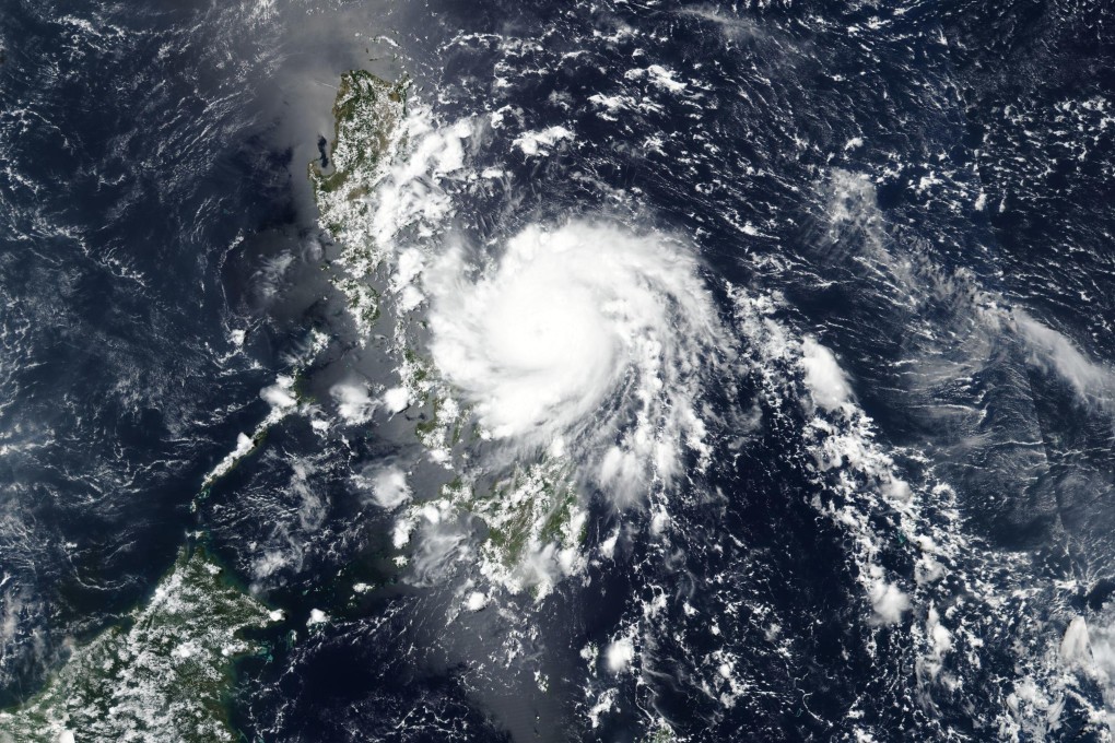 A satellite image released by Nasa shows Typhoon Vongfong roaring toward the eastern Philippines. It made landfall on Thursday, knocking out power and causing heavy rains. Photo: AP