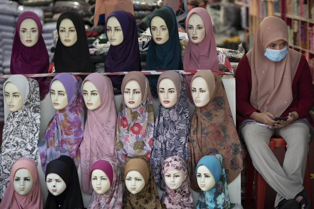 A shop selling headscarves in Kuala Lumpur. Businesses in Malaysia are reopening amid signs measures against the coronavirus are bearing fruit. Photo: AP