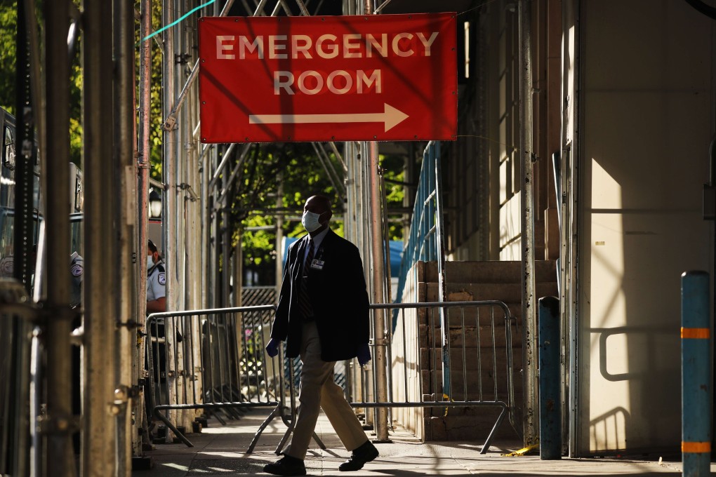 A sign at a hospital in Manhattan, New York City, that is treating coronavirus patients directs visitors to the emergency room entrance. More than 1.42 million people in the United States have been infected with the coronavirus and over 84,000 have died. Photo: Getty Images via AFP