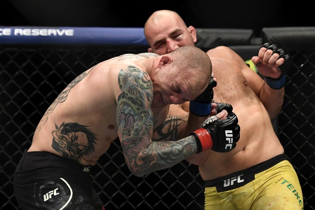 Glover Teixeira lands a punch on Anthony Smith at UFC Fight Night. Photo: AFP