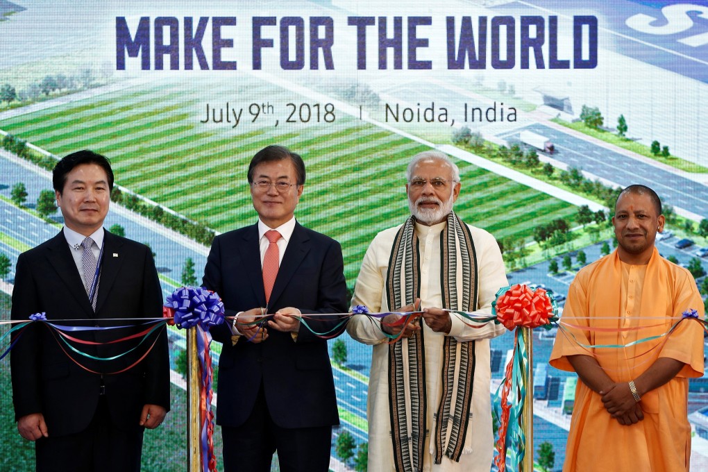 Indian Prime Minister Narendra Modi (second right) with South Korean President Moon Jae-in beside him, at the inauguration of Samsung’s smartphone factory in Uttar Pradesh in 2018. India has long nursed an ambition to be a world manufacturing hub. Photo: Reuters