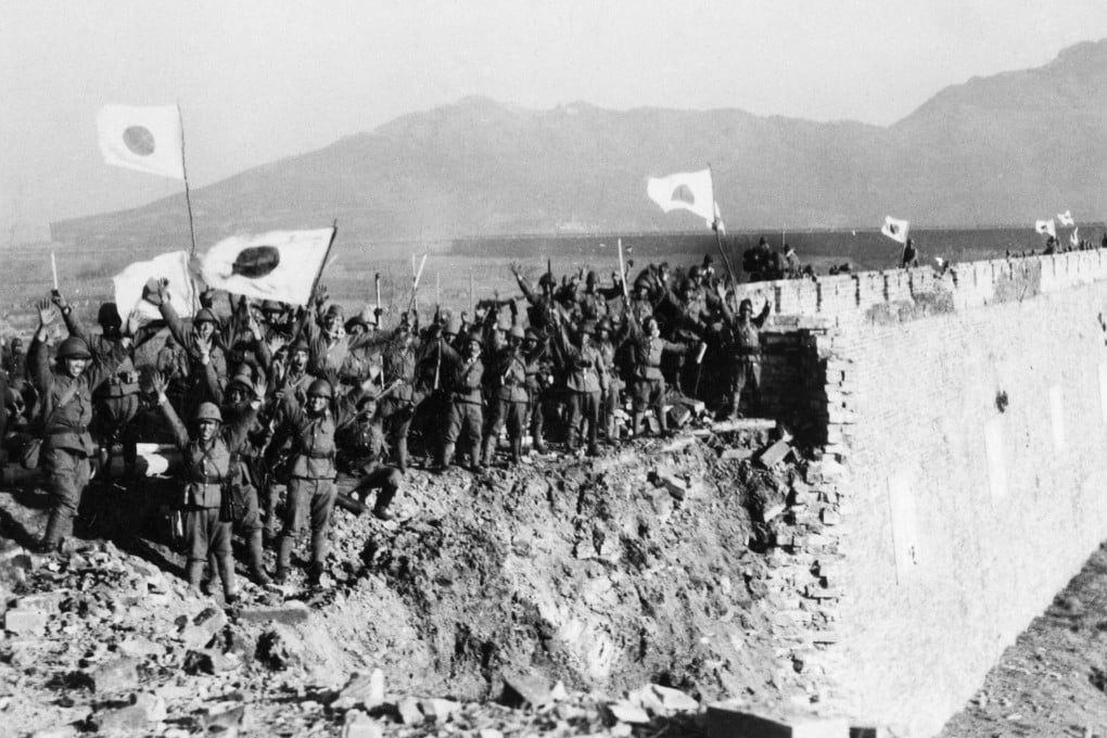 Japanese troops celebrate capturing the former Chinese capital Nanking in December 1937.