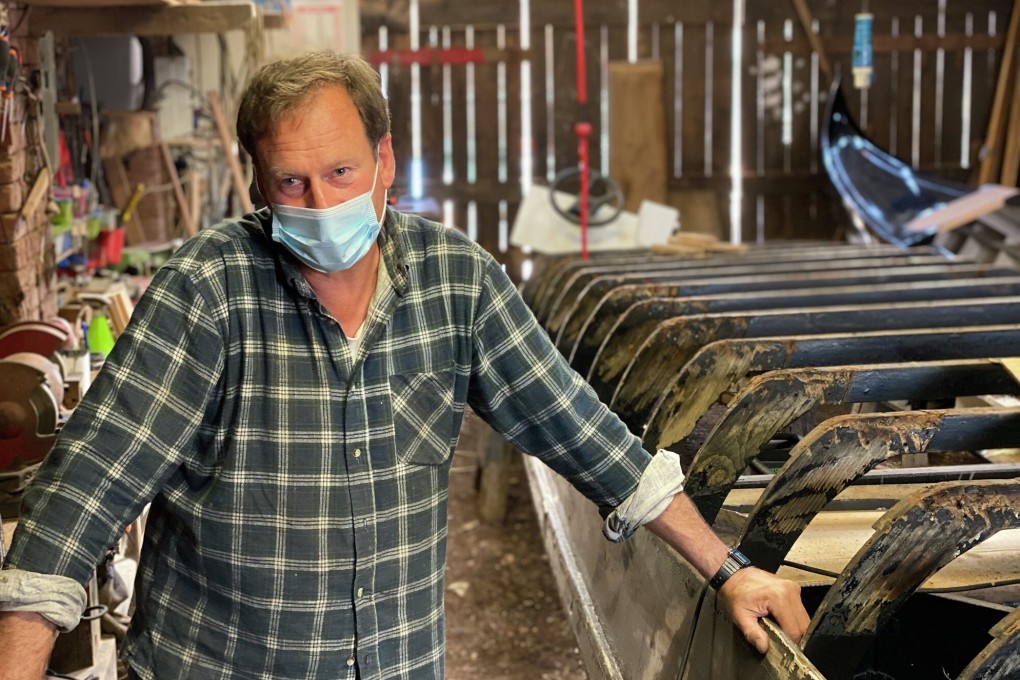 ‘It’s been a terrible year’: Lorenzo Della Toffola in the Venice gondola workshop he runs. Photo: Mario Calabresi