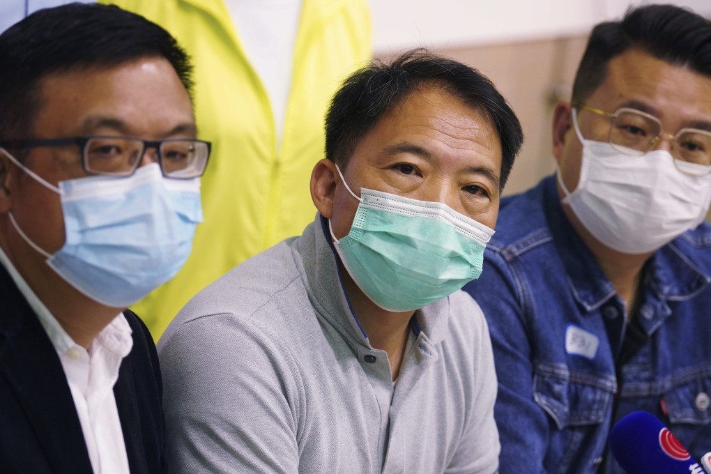 Democratic Party leader Wu Chi-wai (centre), with James To (left) and Andrew Wan (right), speak to the media on Sunday. Photo: Winson Wong