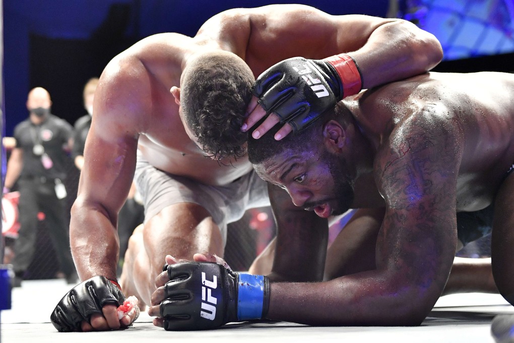 Alistair Overeem consoles Walt Harris after their heavyweight bout at UFC on ESPN. Photo: AFP