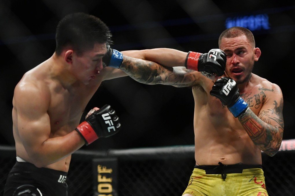 Song Yadong throws down with Marlon Vera during UFC on ESPN at VyStar Veterans Memorial Arena. Photos: USA TODAY Sports