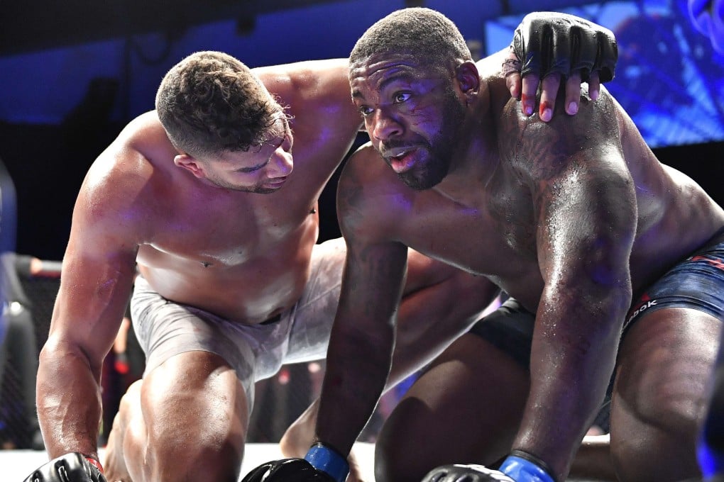 UFC heavyweight Alistair Overeem embraces opponent Walt Harris after their heavyweight bout at UFC Fight Night at VyStar Veterans Memorial Arena in Jacksonville, Florida on Saturday. Photo: AFP