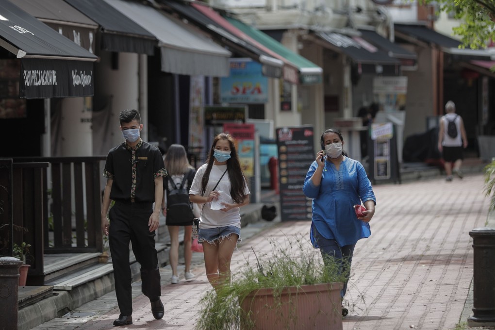 Singapore says ‘critical, low-risk economic activities’ will be allowed to resume operations from June 2. Photo: EPA-EFE