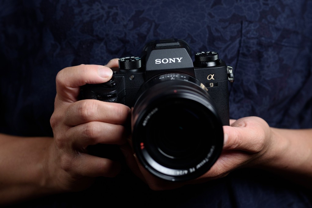 A Sony Corp. Alpha a9 mirrorless digital camera mounted with an FE 24-70mm f/4 ZA OSS standard zoom lens. Photo: Bloomberg