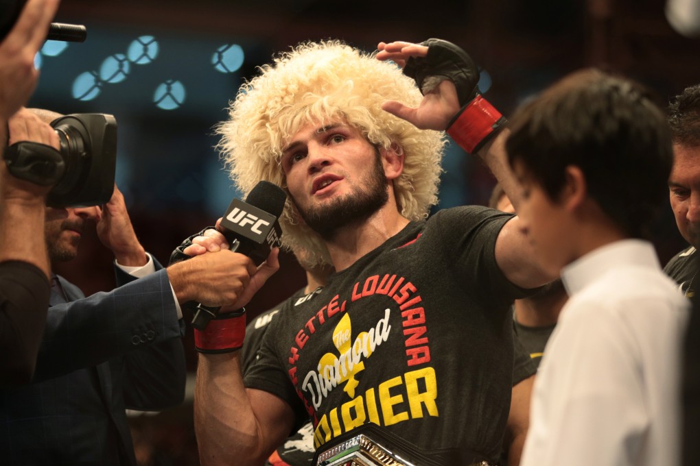 Khabib Nurmagomedov speaks in the Octagon after beating Dustin Poirier at UFC 242. Photo: Reuters