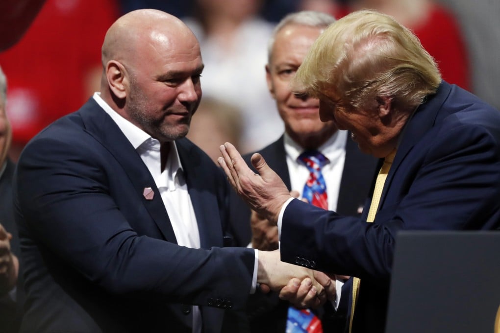 President Donald Trump greets UFC president Dana White at a campaign rally in Colorado in February. Photo: AP