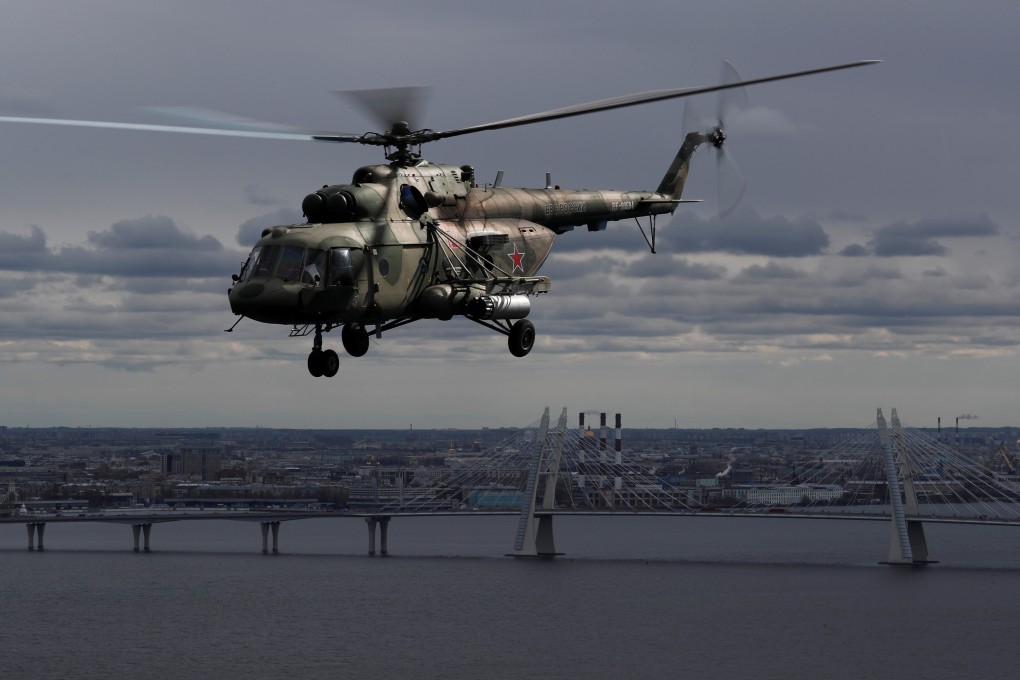 A Russian Mi-8 military helicopter flies during a rehearsal for the Victory Day air parade. Photo: Reuters