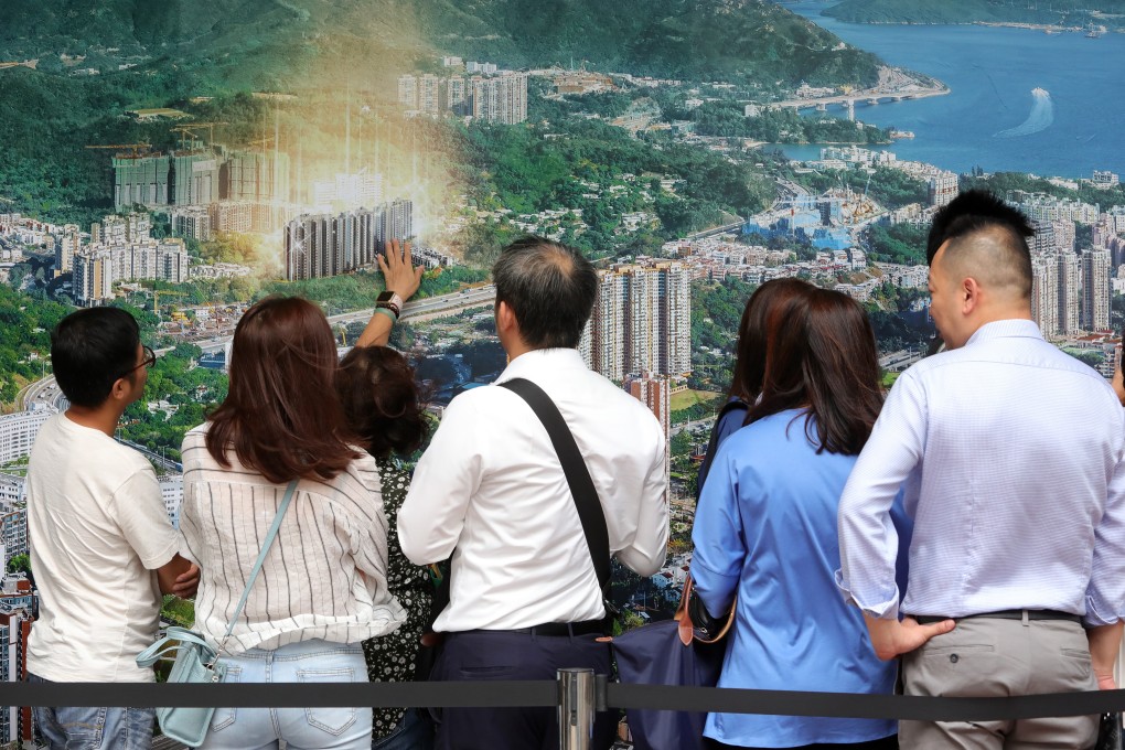 Prospective buyers visit a property sales office in Hong Kong in October 2019. The online viewing of property has become necessary for reducing physical interaction following the pandemic earlier this year. Photo: May Tse