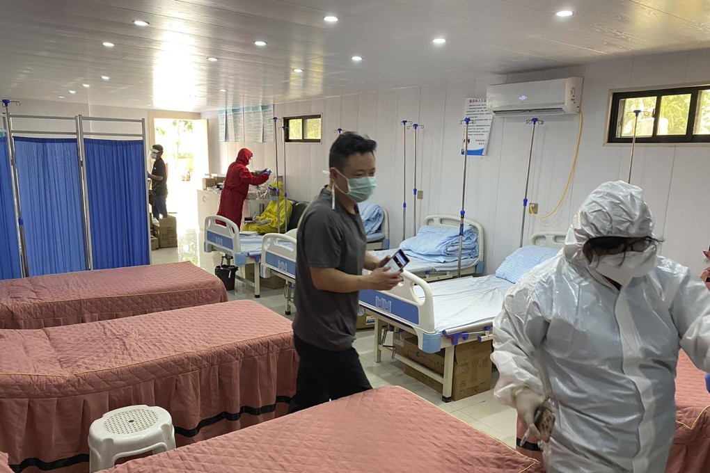 Police teams inspect a seven-bed hospital during a raid at a villa, which was illegally turned into a medical facility in Clark Freeport and Special Economic Zone, northwest of Manila. Photo: AP