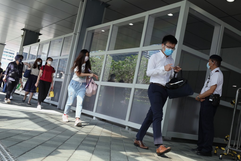 Civil servants return to the government headquarters at Tamar on May 4 as the coronavirus epidemic shows signs of abating. Photo: Nora Tam