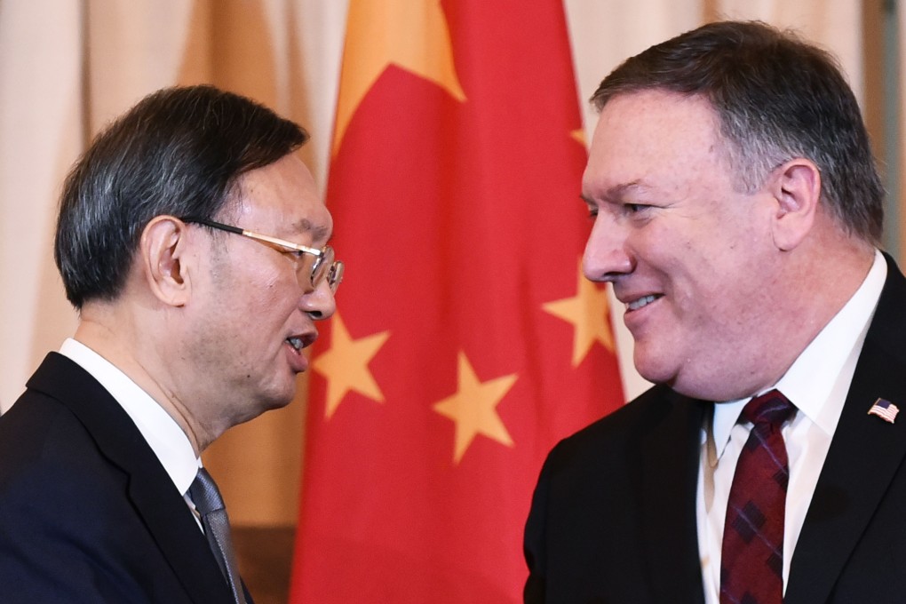 Chinese politburo member Yang Jiechi and US Secretary of State Mike Pompeo shake hands after a press conference during the US-China Diplomatic and Security Dialogue at the State Department in Washington on November 9, 2018. Photo: AFP