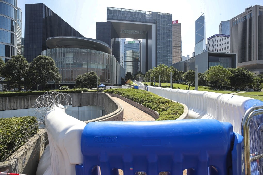 Water-filled barriers have been installed around the Legislative Council complex and other buildings in the wake of violent unrest in Hong Kong. Photo: Winson Wong